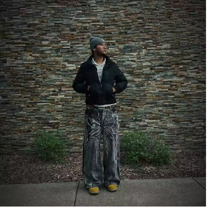 Black wide pants with spider web embroidery